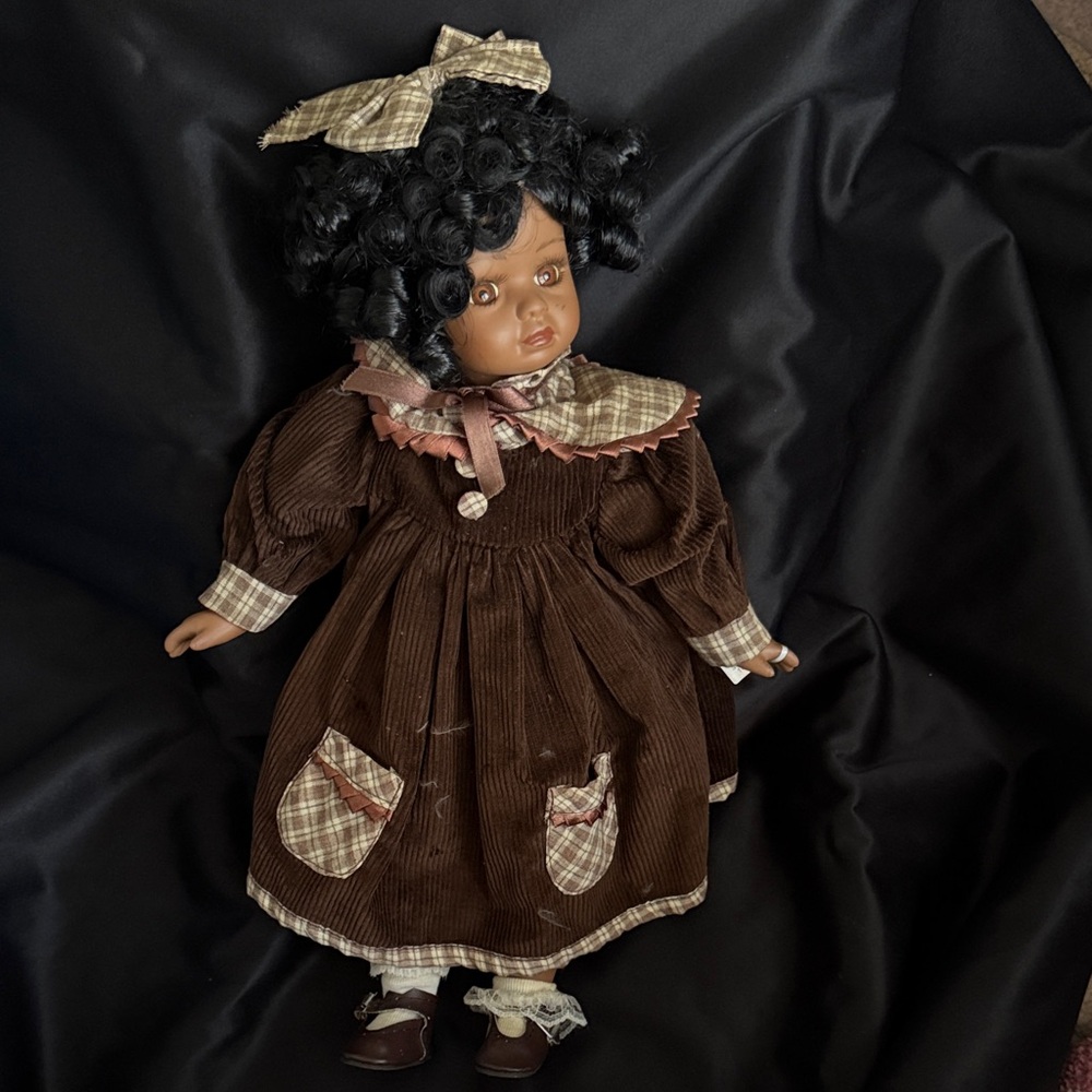 Elegant Brown Doll with Plaid Dress